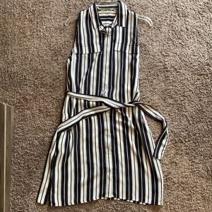 Blue and white vertical striped work dress with pockets, snap closure
